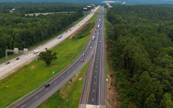 July 23, 2021 Monroe County - Aerial photo shows I-75 (L-southbound, R-northbound) and I-475 interchange (merge right from center) on Friday, July 23, 2021. Two trucks-only northbound lanes along 41 miles of I-75 from the I-475 interchange in Monroe County to Ga. 20 in Henry County. (Hyosub Shin / Hyosub.Shin@ajc.com)