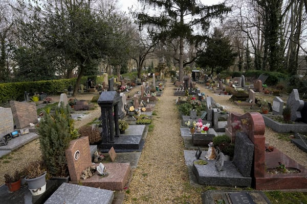 Graves at the pet cemetery of Asnieres-sur-Seine, west of Paris, Friday, Feb. 21, 2025. (AP Photo/Michel Euler)