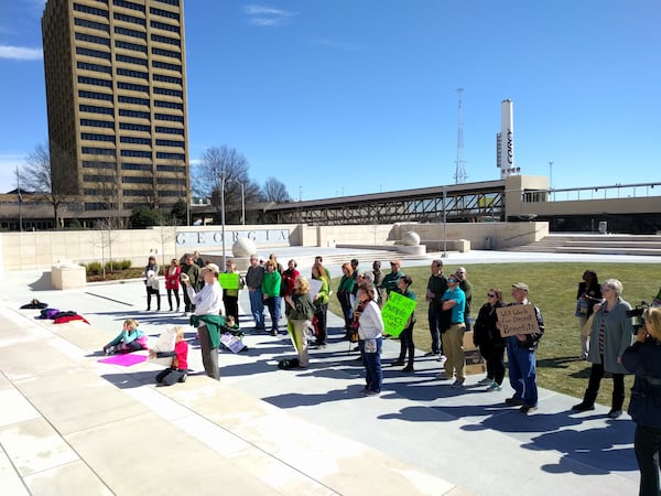 Feb. 16, 2016, Atlanta -- Parents and teachers with the group TRAGIC rally across the street from the Gold Dome. TY TAGAMI/AJC