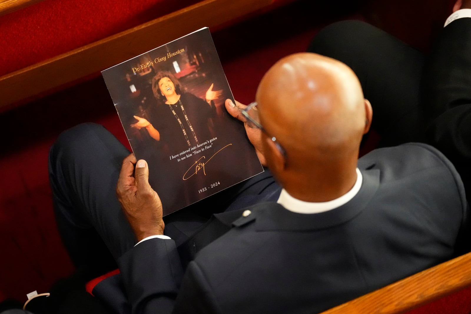 A person attends a ceremony celebrating the life for Cissy Houston on Thursday, Oct. 17, 2024, at the New Hope Baptist Church in Newark, N.J. (Photo by Charles Sykes/Invision/AP)