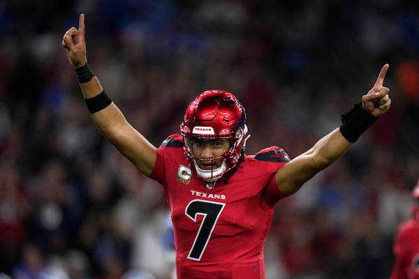 Houston Texans quarterback C.J. Stroud celebrates after throwing a touchdown pass during the first half of an NFL football game against the Detroit Lions, Sunday, Nov. 10, 2024, in Houston. (AP Photo/Eric Christian Smith)