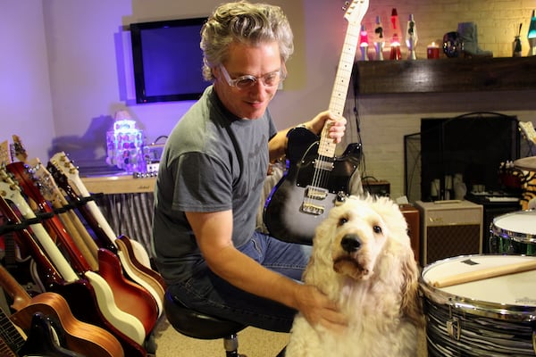 Ed Roland and his sweet pup, Trooper. Photo: Melissa Ruggieri/AJC.