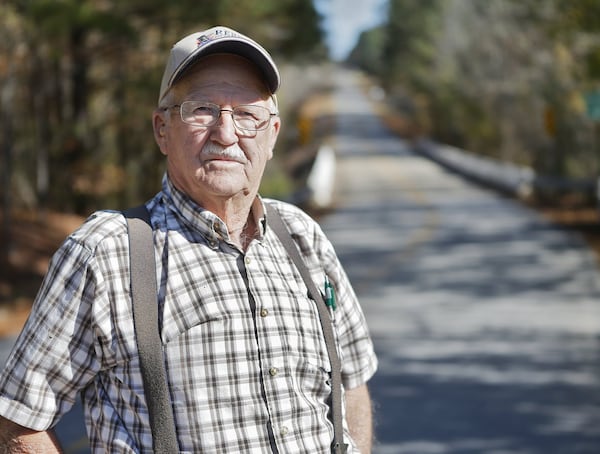 Clint Adams, with the current Moore’s Ford bridge behind him, is the only known living witness to the Moore’s Ford lynching. He’s 81 and hasn’t spoken publicly in years about the case. Four black Georgians were shot to death in 1946 near Moore’s Ford Bridge, spanning the river between Walton and Oconee counties. BOB ANDRES /BANDRES@AJC.COM