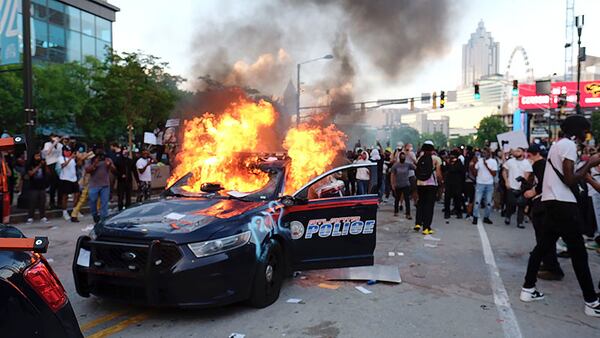 Following a peaceful march to the Georgia Capitol in the response to the police killing of George Floyd in Minneapolis, protesters returned to the area around the Centennial Olympic Park and CNN Center in downtown Atlanta where some confronted police.