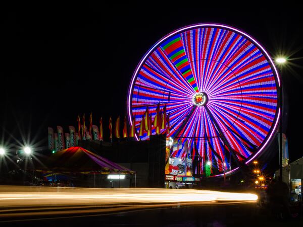 A Ferris wheel rotates at the Georgia National Fair in Perry. At least four cases of E. coli have been linked to children who attended the Georgia National Fair earlier this month have been confirmed, according to multiple reports. (Sarah White / UGA Photojournalism workshop)