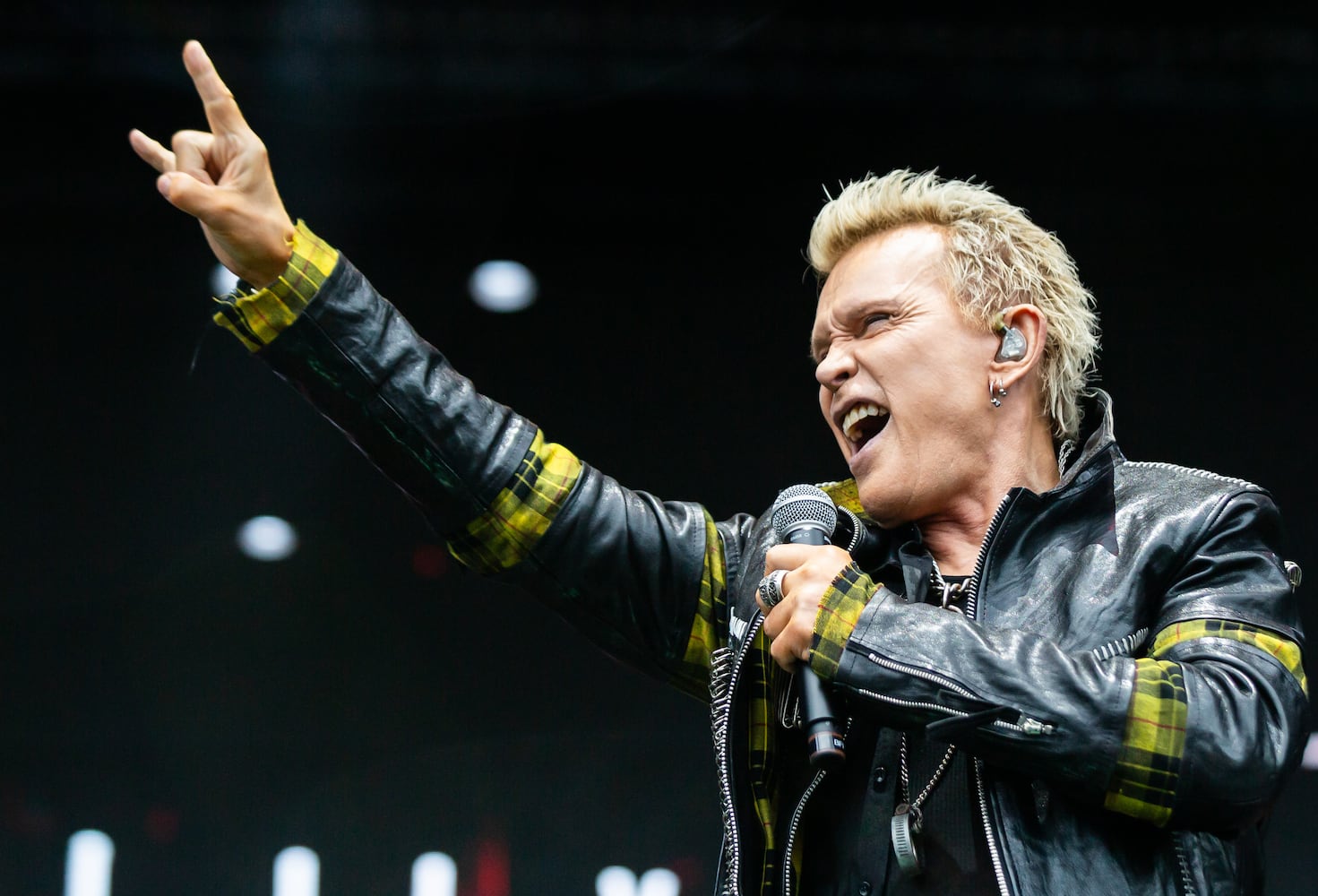 Atlanta, Ga: After a torrential downpour, Billy Idol came through and wowed the crowd with hits. The 68 year old didn't miss a beat despite wireless complications at the beginning of his set. Photo taken Sunday May 5, 2024 at Central Park, Old 4th Ward. (RYAN FLEISHER FOR THE ATLANTA JOURNAL-CONSTITUTION)