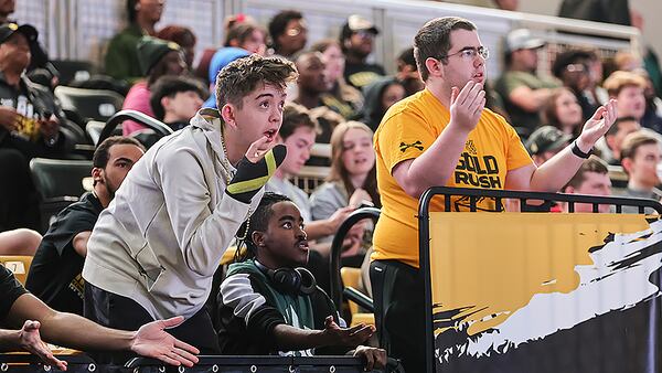 Kennesaw State students react during a watch party at KSU convocation Center as the men’s basketball team appears in their first NCAA tournament on Friday, March 17, 2023.  (Natrice Miller/ natrice.miller@ajc.com)