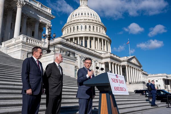 Speaker of the House Mike Johnson, R-La., joined from left by Rep. Richard Hudson, R-N.C., chairman of the National Republican Congressional Committee, and Majority Whip Tom Emmer, R-Minn., touts Republican wins as he meets with reporters on the steps of the Capitol in Washington, Tuesday, Nov. 12, 2024. Congress returns to work this week to begin what is known as a lame-duck session, that period between Election Day and the end of the two-year congressional term. (AP Photo/J. Scott Applewhite)