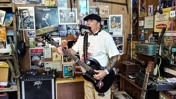 Deak Harp performs in his harmonica shop in Clarksdale, Mississippi, one of many venues at the Juke Joint Festival this spring.
Courtesy of Blake Guthrie