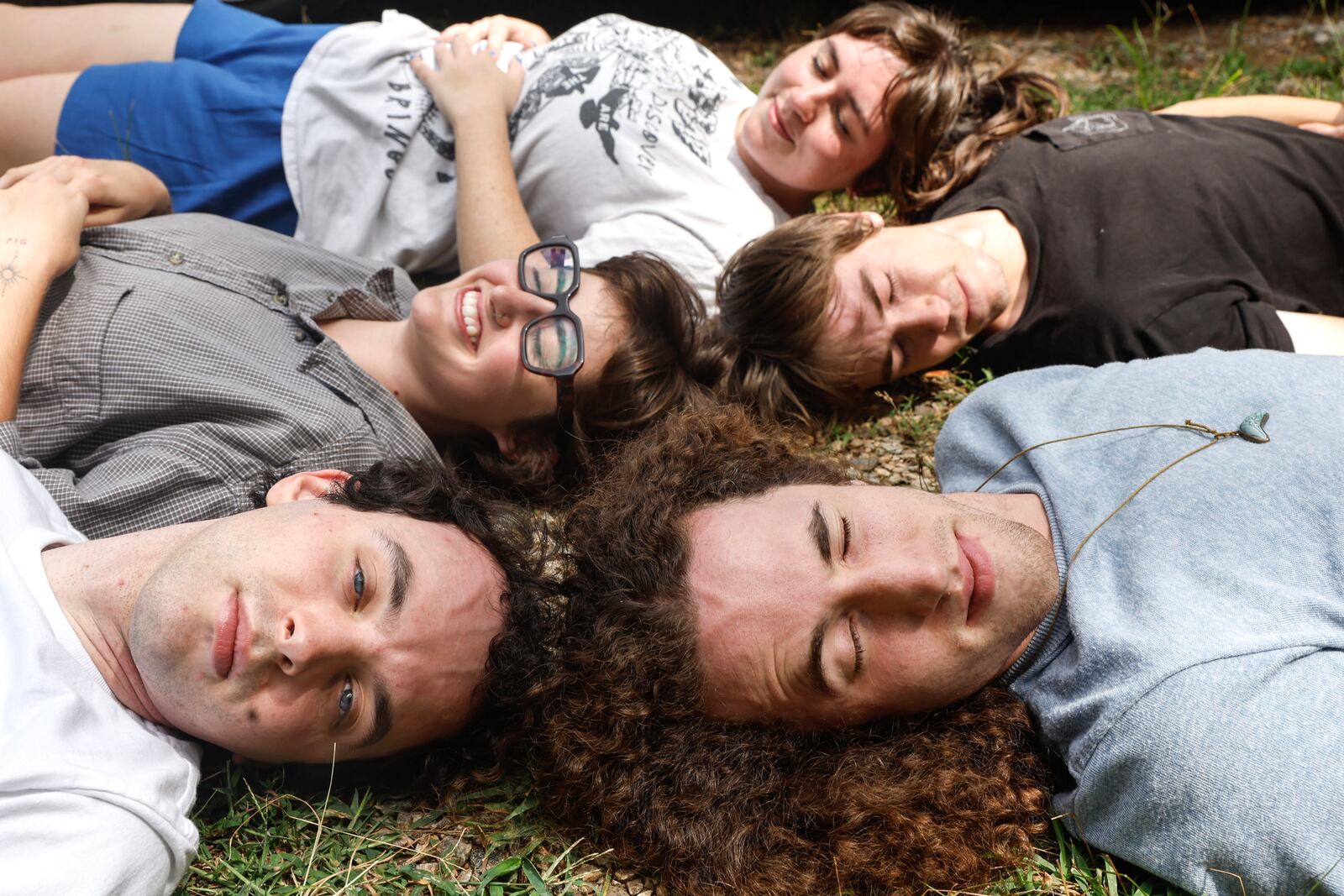 Rock band Lunar Vacation poses for a portrait at their home in Decatur on Tuesday, Aug. 20, 2024. (Natrice Miller/AJC)