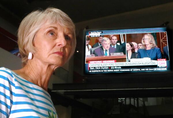 September 27, 2018 Atlanta: Linda Byrne listens to Christine Blasey Ford testify live while watching the Brett Kavanaugh hearings while having lunch on Thursday, Sept 27, 2018, in Atlanta.   Curtis Compton/ccompton@ajc.com