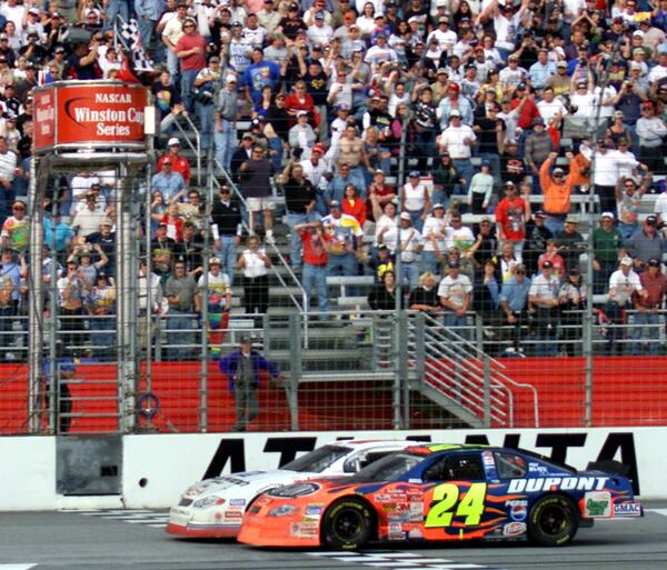 Kevin Harvick (29) wins the NASCAR Cracker Barrel 500 in a photo finish ahead of Jeff Gordon (24) at Atlanta Motor Speedway, Sunday, March 11, 2001. (AP Photo/Fort Worth Star-Telegram, Gregg Ellman)