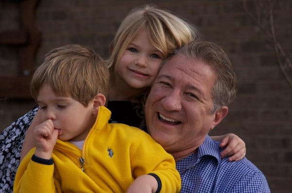 Steve McCoy and his grandchildren, Lucy and Jack.