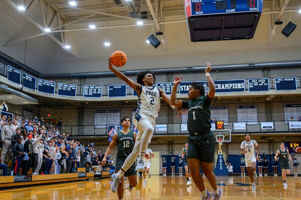 Pace Academy's Eric Chatfield Jr. drives  to the basket in a December game against Westminster.