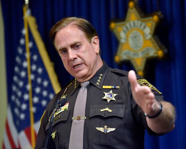 Oakland County Sheriff Michael Bouchard speaks at a news conference, Thursday, July 2, 2020, in Pontiac, Mich., to confirm one felonious assault charge each has been filed against Eric and Jillian Wuestenberg, both of Independence Township, after a confrontation that resulted in pointing hand guns at Takelia Hill and her children after exiting a restaurant in Orion Township, a day earlier. (Todd McInturf/Detroit News via AP)