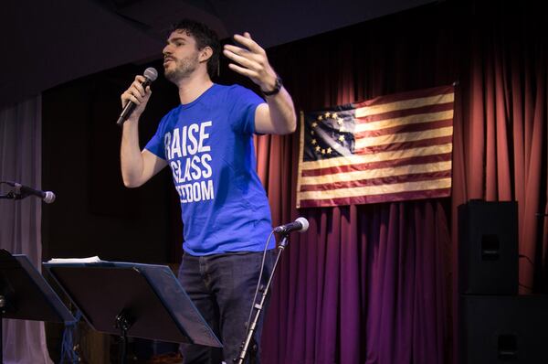 Donald Milton III explains how the Hamiltunes ATL works before the start of the all-ages sing-through at the Vista Room on April 22. CONTRIBUTED BY STEVE SCHAEFER