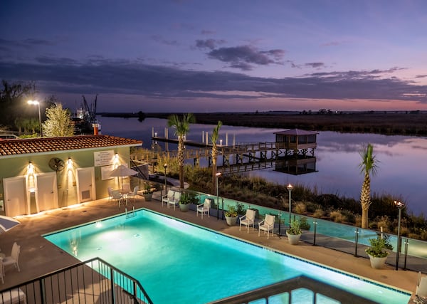 Among the amenities at Oaks on the River Boutique Resort is an outdoor heated pool with bar and a private dock. COURTESY OF 360 DEGREE TOTAL MARKETING