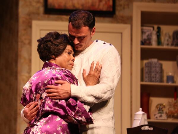 Denise Burse and Lee Osorio share a tender moment in True Colors’ comedy-drama “Dot.” CONTRIBUTED BY BRENDA NICOLE PHOTOGRAPHY