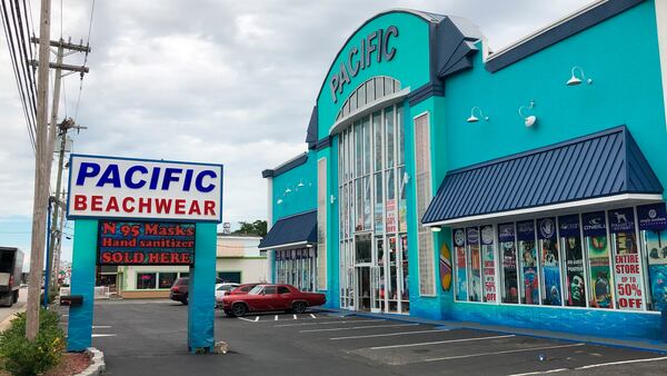 A beachwear store also advertises it sells protective gear against COVID-19 in Myrtle Beach.