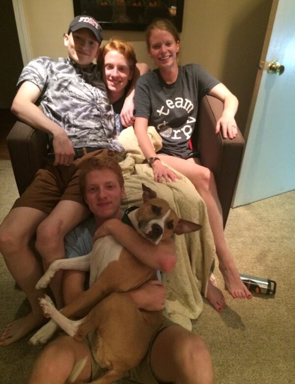 Darla with the Torpy kids (top, from left) Michael, Fred, Emma and Liam (bottom). (Bill Torpy / AJC)