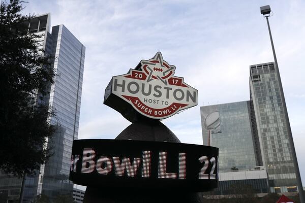 This Jan. 14, 2017 photo shows a countdown sign leading up to Super Bowl LI in Discovery Green park in downtown Houston. Super Bowl LI will be played Feb. 5 at NRG Stadium in Houston. (AP Photo/David J. Phillip)