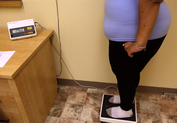 Seventeen year-old Marissa Hamilton stands on a scale during her weekly weigh-in at the Wellspring Academy October 21, 2009 in Reedley, California. Struggling with her weight, seventeen year-old Marissa Hamilton enrolled at the Wellspring Academy, a special school that helps teens and college level students lose weight along with academic courses. When Marissa first started her semester at Wellspring she weighed in at 340 pounds and has since dropped over 40 pounds of weight in the first two months of the program. According to the Centers for Disease Control and Prevention, 16 percent of children in the US ages 6-19 years are overweight or obese, three times the amount since 1980.