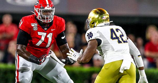 Georgia left tackle Andrew Thomas (71) was a first-team All-American in 2019. Thomas led Pace Academy to a Class AAA championship in 2015. He's one of 350 alumni of current AAA schools on college football rosters in 2019.