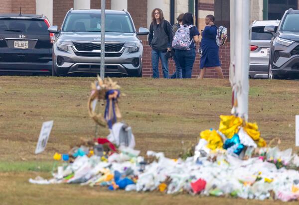 As students arrived at Apalachee High School on Tuesday morning, Sept.24, 2024 the scene looked like a typical school day. Cars and buses circled through the car pool drop-off. Students carrying backpacks made their way from the parking lot to class. Tuesday was the first day of classes at the Barrow County school since the shooting. (John Spink/AJC)