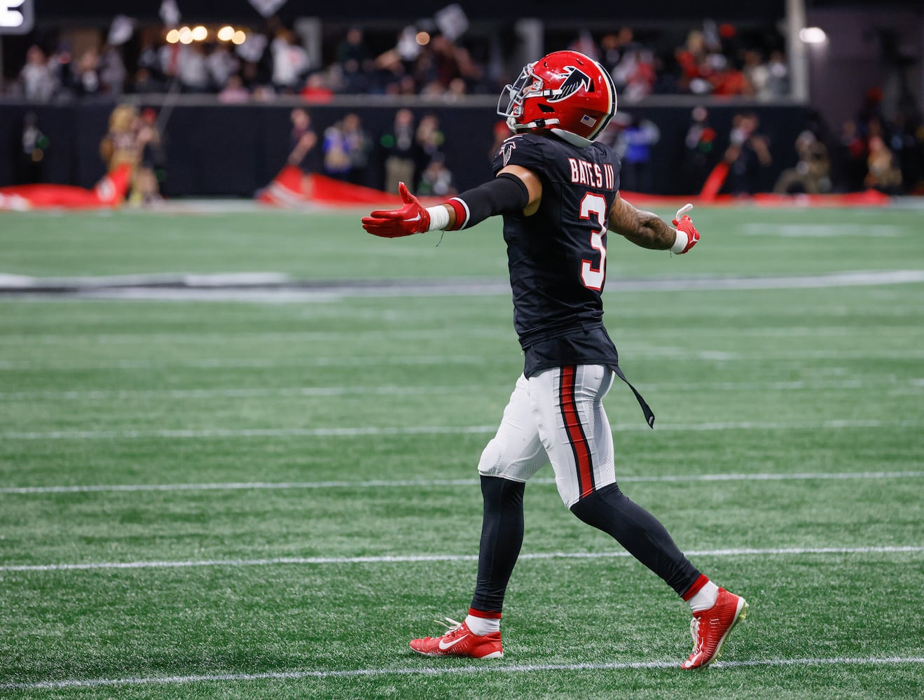 Atlanta Falcons safety Jessie Bates III (3) celebrates his interception return for a touchdown in a NFL football game between the Atlanta Falcons and the New Orleans Saints in Atlanta on Sunday, Nov. 26, 2023.   (Bob Andres for the Atlanta Journal Constitution)