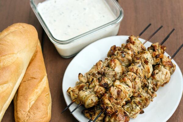 Ticonderoga Club Chicken Spiedie shown with Ticonderoga Club's mayonnaise-based chicken marinade. (Courtesy of Bart Sasso)