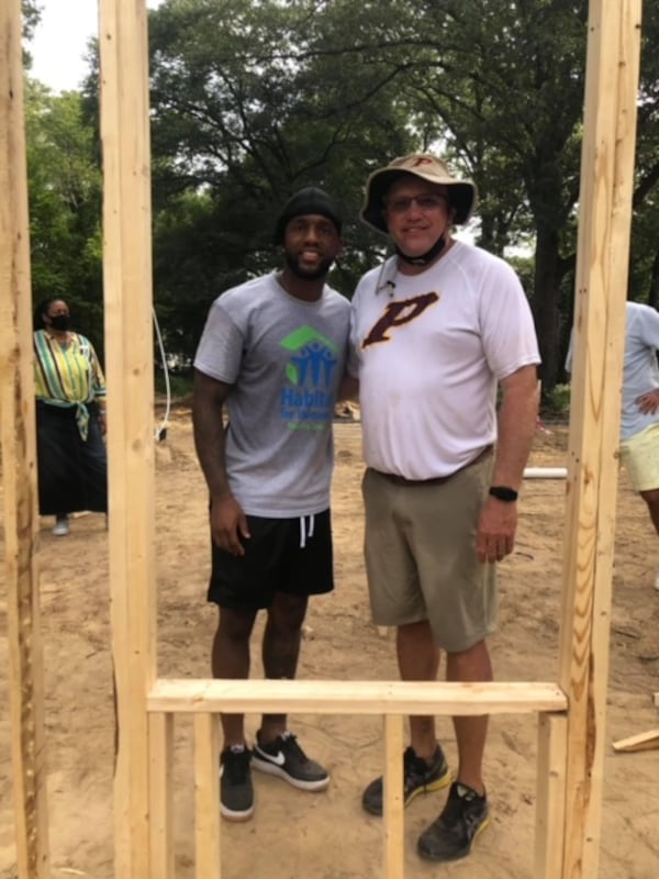 Atlanta Falcons defensive back Casey Hayward and Perry High School football coach Kevin Smith during a workday at a Habitat for Humanity house in Perry, Ga., Hayward’s hometown. (Photo submitted by Shan Williams)