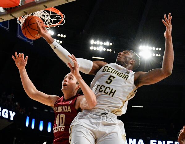  Florida State forward Brandon Allen (40) and Georgia Tech guard Josh Okogie (5) vie for a rebound during the second half of an NCAA basketball game Wednesday, Jan. 25, 2017, in Atlanta. Georgia Tech won 78-56. (AP Photo/John Amis)