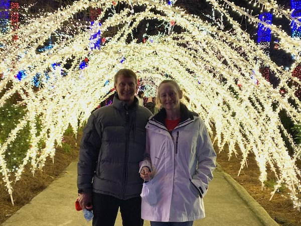 Richard and Sherrie Taylor inside the Tunnel of Joy. In 2020, they added 100,000 lights to create this part of the Lights of Joy attraction, which grew from a drive-by experience to a walk-through one in 2018. Courtesy of Richard Taylor