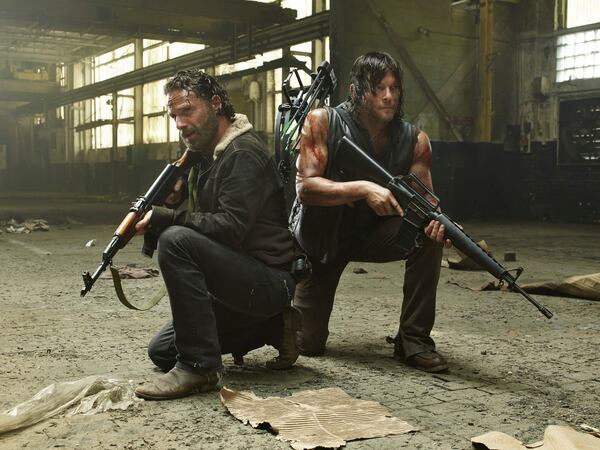 Andrew Lincoln as Rick Grimes and Norman Reedus as Daryl Dixon - The Walking Dead _ Season 5, Gallery - Photo Credit: Frank Ockenfels 3/AMC Our buds Andrew Lincoln and Norman Reedus in a pickle as usual. CREDIT: AMC