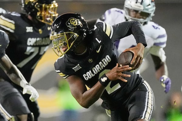 FILE - Colorado quarterback Shedeur Sanders (2) in the second half of an NCAA college football game Saturday, Oct. 12, 2024, in Boulder, Colo. (AP Photo/David Zalubowski)