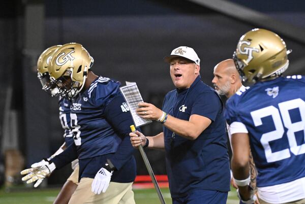 Georgia Tech’s head coach Geoff Collins instructs during the first football practice of the season at Rose Bowl Field on Georgia Tech Campus in Atlanta on Friday, August 5, 2022. (Hyosub Shin / Hyosub.Shin@ajc.com)