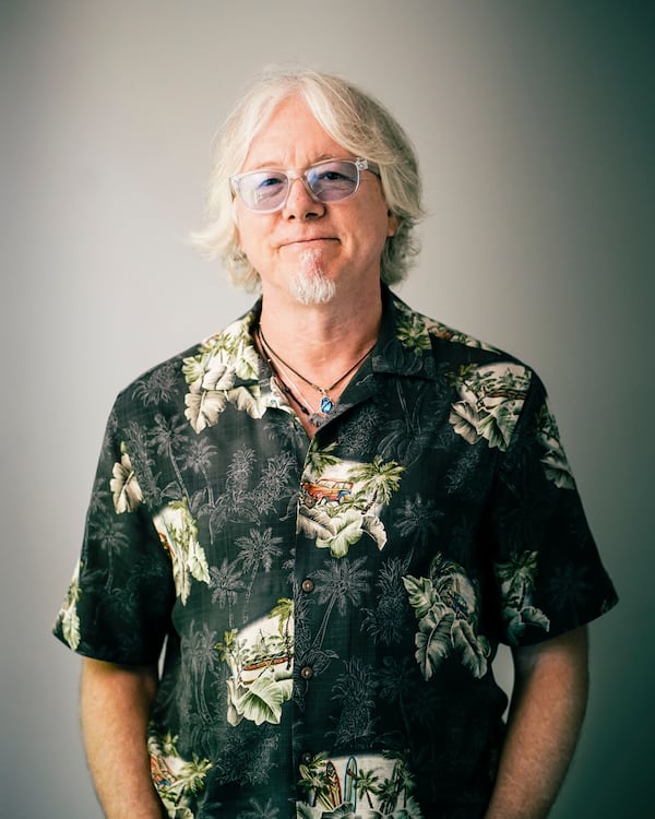 Mike Mills of R.E.M. visiting the studio of 97.1 The River in 2019. Photo: Jesse Brooks/Cox Media