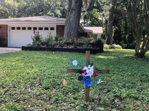 A cross placed in memory of Ahmaud Arbery, who was fatally shot in February. No arrests have been made. Photo: Bert Roughton Jr.