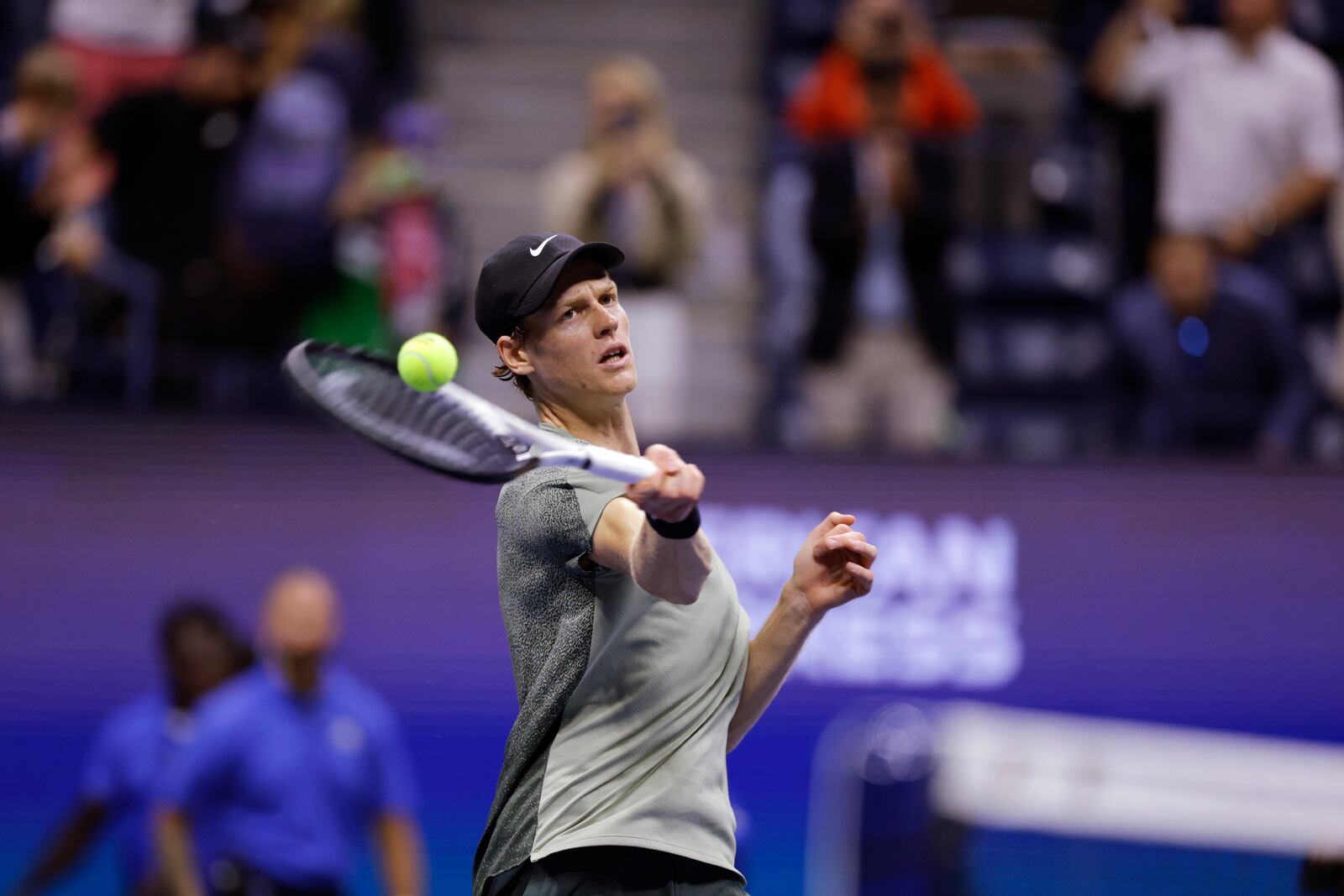 Jannik Sinner, of Italy, launches a ball after defeating Daniil Medvedev, of Russia, during the quarterfinals of the U.S. Open tennis championships, Wednesday, Sept. 4, 2024, in New York. (AP Photo/Adam Hunger)