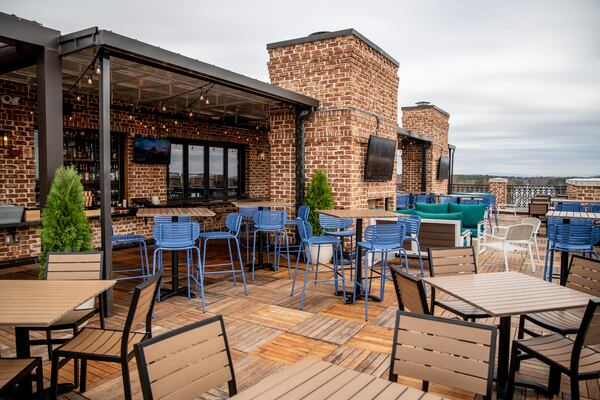 UP on the Roof's patio offers 360-degree rooftop views, ranging from nearby Town Green and City Hall, to Kennesaw Mountain in the distance. (Mia Yakel for The Atlanta Journal-Constitution)