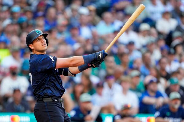 National League's Austin Riley, of the Atlanta Braves, follows through during the MLB All-Star baseball game against the American League in Seattle, Tuesday, July 11, 2023. (AP Photo/Lindsey Wasson)