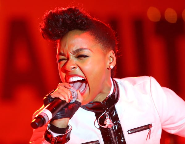 123113 ATLANTA: Headliner Janelle Monae performs on the main stage just before the Peach Drop at Underground Atlanta on Tuesday, Dec. 31, 2013, in Atlanta.   CURTIS COMPTON / CCOMPTON@AJC.COM