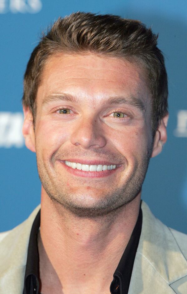  LAS VEGAS - APRIL 21: Television personality Ryan Seacrest arrives at an auction for PETA held at the groundbreaking party for the third tower at Panorama Towers, a USD 1 billion high-rise residential community, being developed by Hallier Properties April 21, 2006 in Las Vegas, Nevada. (Photo by Ethan Miller/Getty Images)