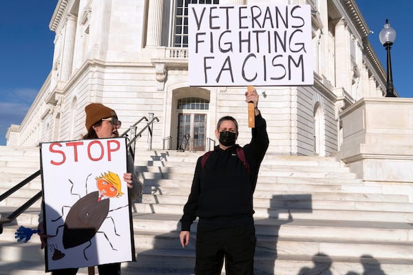 Demonstrators rally in support of Ukraine outside of the U.S Capitol ahead of President Donald Trump addresses a joint session of Congress on Capitol Hill in Washington, Tuesday, March 4, 2025. (AP Photo/Jose Luis Magana)