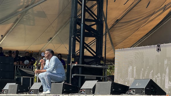 Rap icon Big Daddy Kane laughed at himself as he sweated in a powder blue Louis Vuitton outfit in Atlanta’s late October heat for ONE Musicfest on Saturday, Oct. 28, 2023. (Photo: Leon Stafford/AJC)