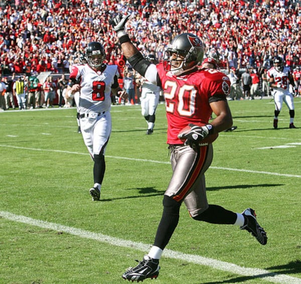 Ronde Barber scores after he intercepted a Chris Redman pass and returned it 29 yards for a touchdown. 