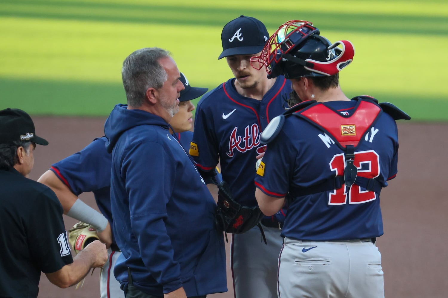 Atlanta Braves pitcher Max Fried is checked after he was hit by a grounder from San Diego Padres outfielder Fernando Tatis Jr. during the first inning of National League Division Series Wild Card Game Two at Petco Park in San Diego on Wednesday, Oct. 2, 2024.   (Jason Getz / Jason.Getz@ajc.com)