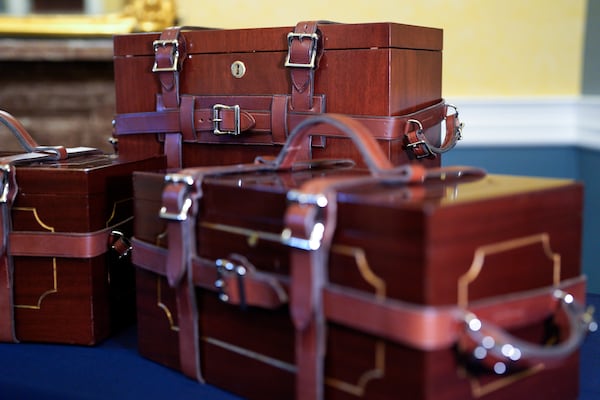 The mahogany boxes that will hold the electoral votes are on display on Capitol Hill, Thursday, Dec. 19, 2024, in Washington. (AP Photo/Yuri Gripas)