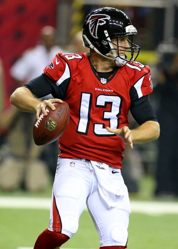 Falcons quarterback T.J. Yates looks to pass against the Titans during the second half in their NFL exhibition game on Sunday, August 23, 2014, in Atlanta.