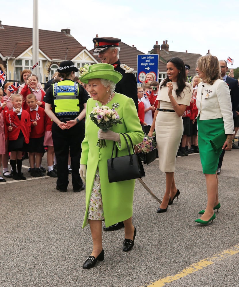 Photos: Meghan Markle stuns at first solo outing with Queen Elizabeth